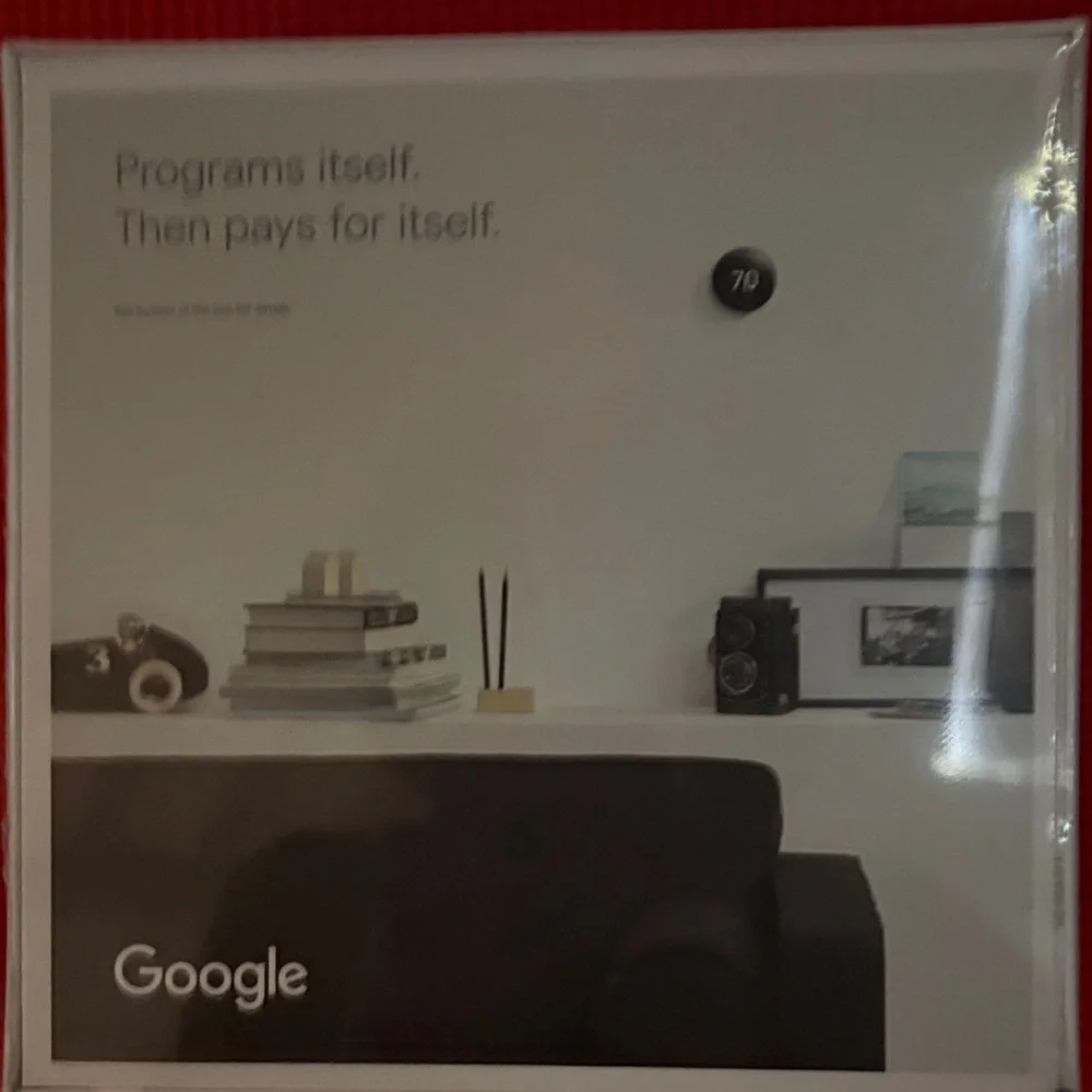 Google Nest Learning Thermostat - Sleek Black Design